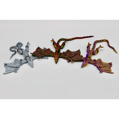 Three dragon figurines.