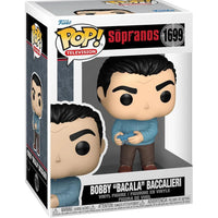 Funko pop! Vinyl figure of bobby ’bacala’ baccalieri from the sopranos, dressed in a light blue sweater and brown pants while holding a blue remote control.