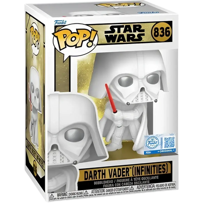White vinyl darth vader funko pop from star wars legends holding a red lightsaber in a window display box