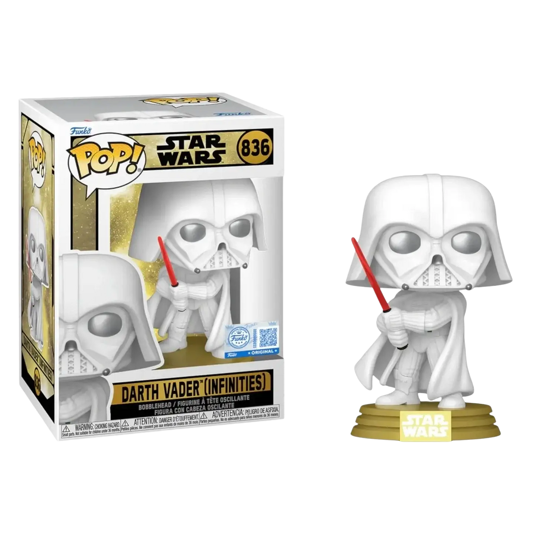White darth vader funko pop figure holding red lightsaber on gold base in star wars legends window display box