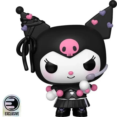Black and pink kawaii character figurine with a skull emblem on its forehead, wearing a party hat adorned with hearts.