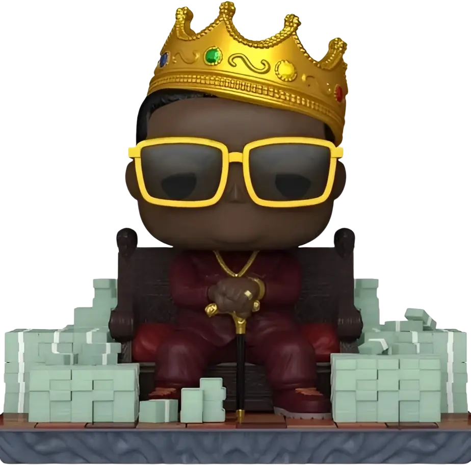 Funko pop action figure of the notorious big seated in red attire with yellow sunglasses and a golden crown holding a cane