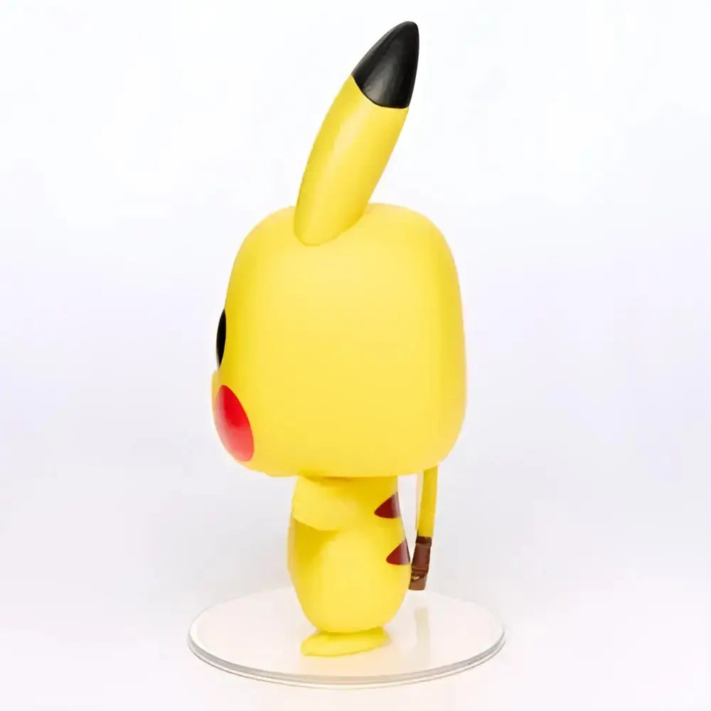 Funko Pop Pokémon Pikachu vinyl figure with yellow body, black-tipped ears, red cheeks on a clear base