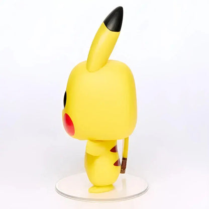 Funko Pop Pokémon Pikachu vinyl figure with yellow body, black-tipped ears, red cheeks on a clear base