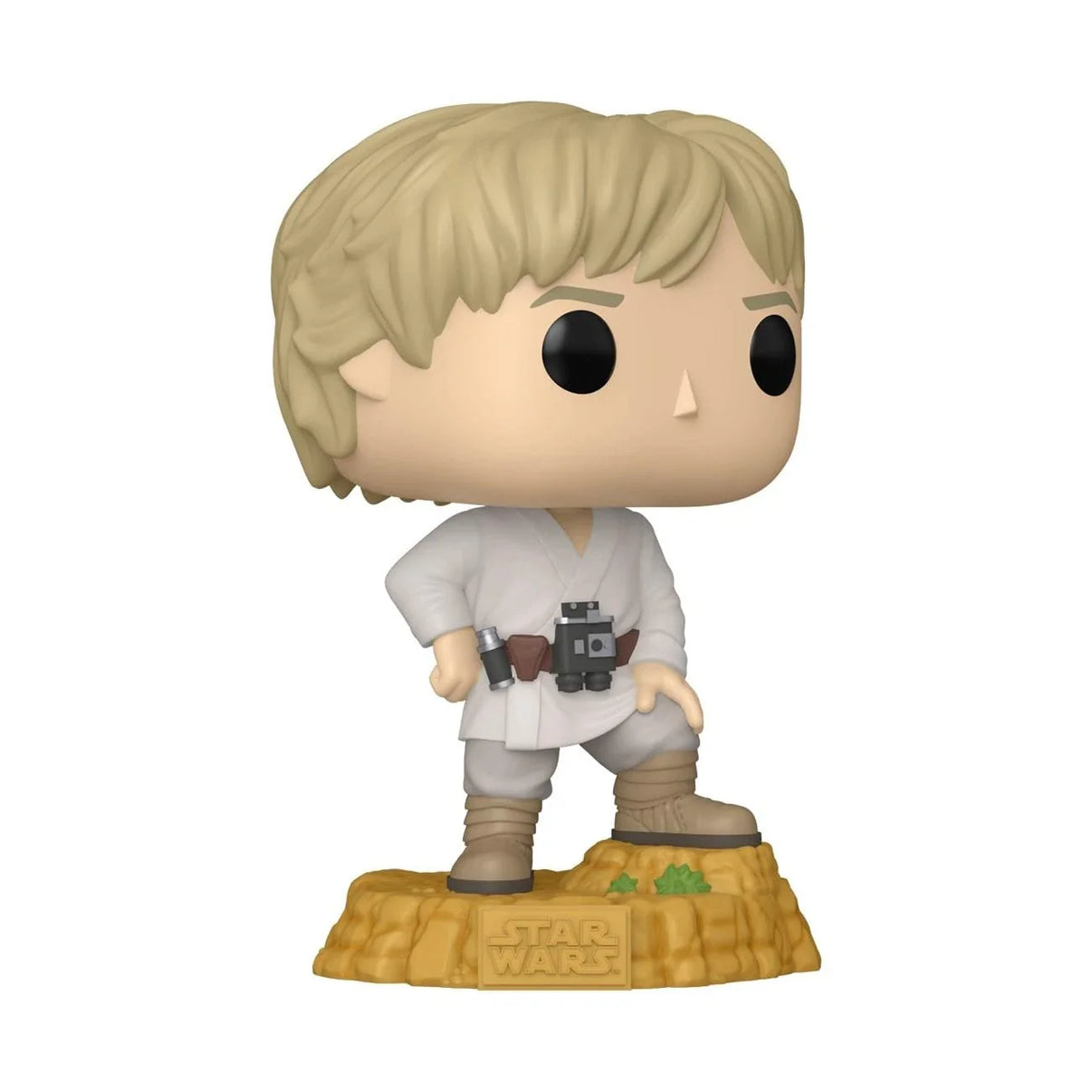 A blonde-haired luke skywalker funko pop figure in a white jedi robe with brown boots, standing on a textured desert base.