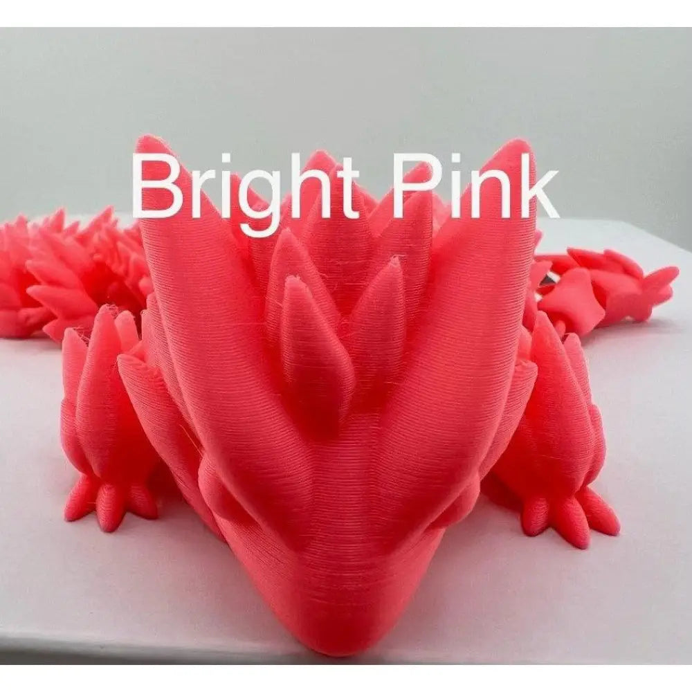 Bright pink 3D-printed dragon.