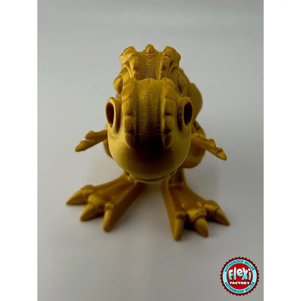 Golden 3D-printed dragon figurine.