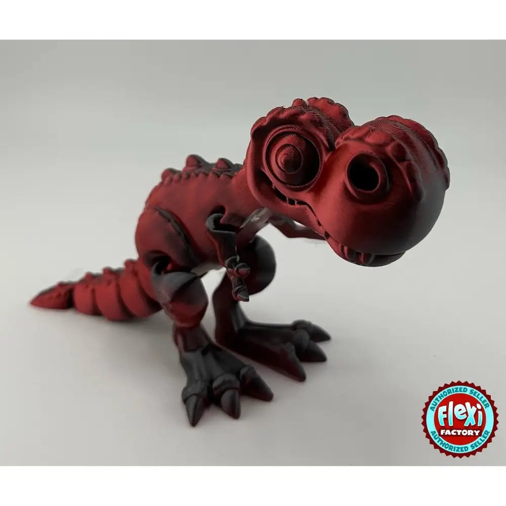 Red and black articulated dinosaur toy.