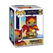 Harry Potter Fawkes on Perch Premium Funko Pop! Vinyl Figure in its box, a vibrant red & gold phoenix.
