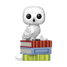 Harry Potter Hedwig on Books Funko Pop! Vinyl Figure #213, white owl on a stack of red, blue, and green books.