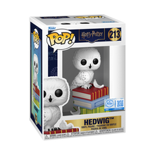 Harry Potter Hedwig on Books Funko Pop! Vinyl Figure #213 in box. White owl figure sitting on books.
