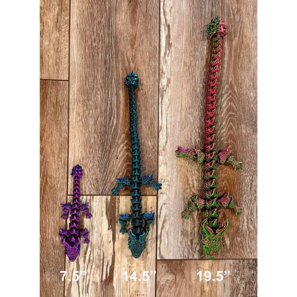 Three dragon-shaped decorative swords.