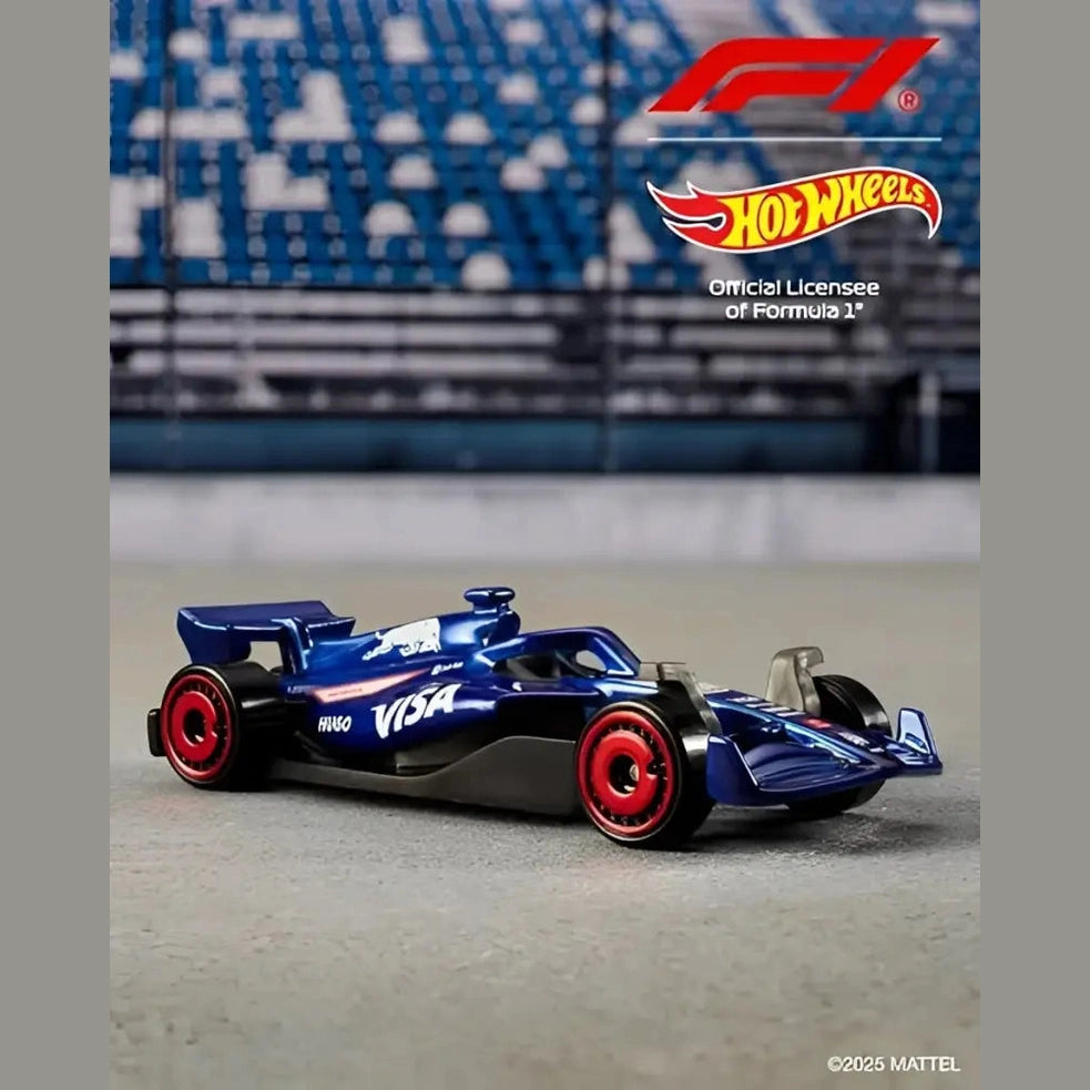 A blue toy Formula 1 race car with red wheels.