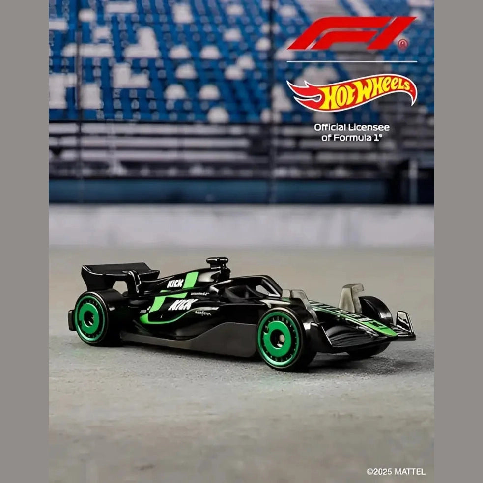 A black and green Hot Wheels Formula 1 race car toy.