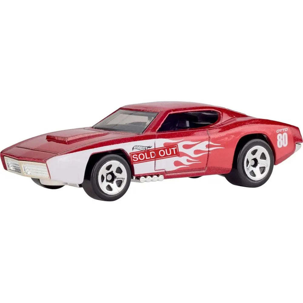 Red and white toy muscle car with flame decals.