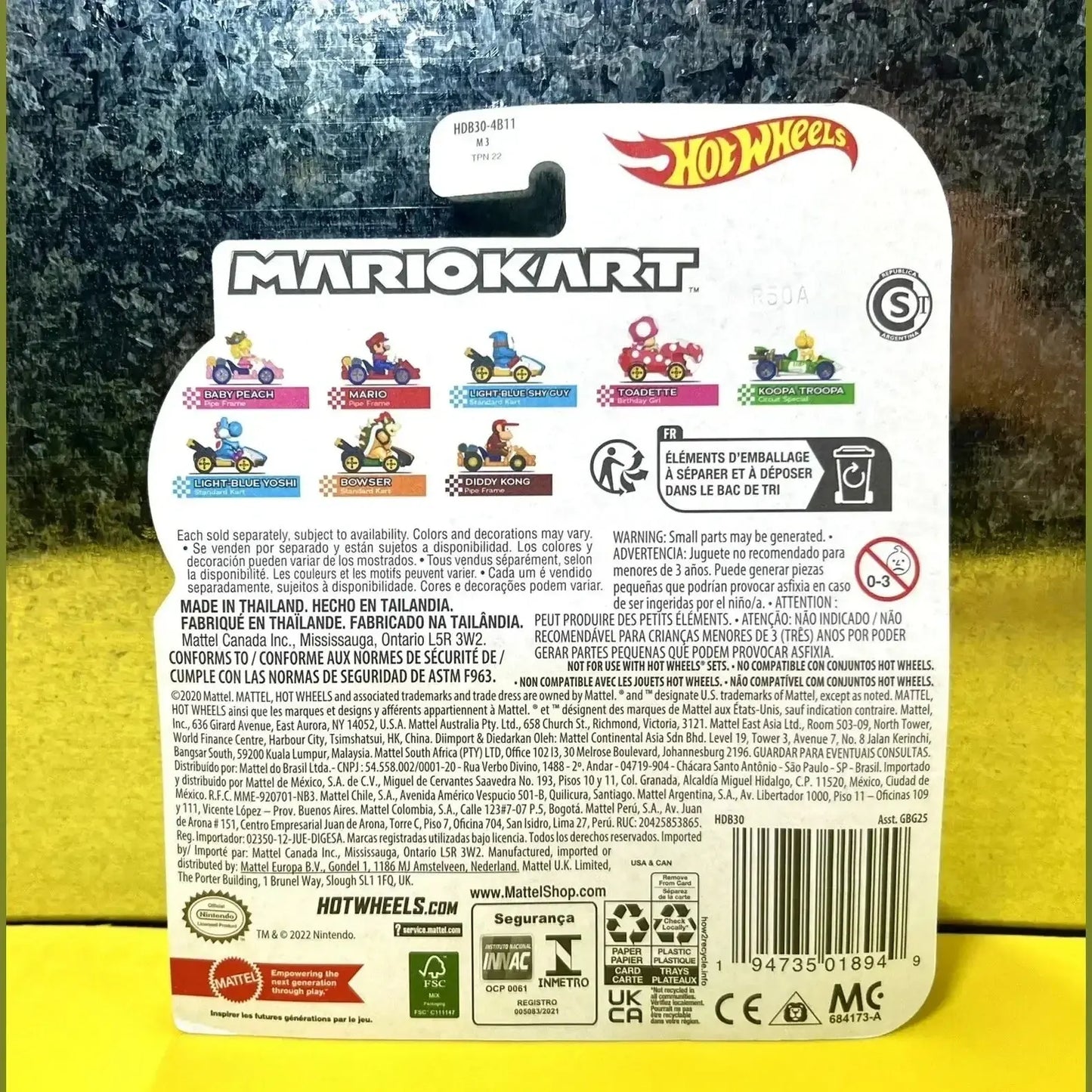 Hot wheels mario kart toy car with colorful design and packaging.