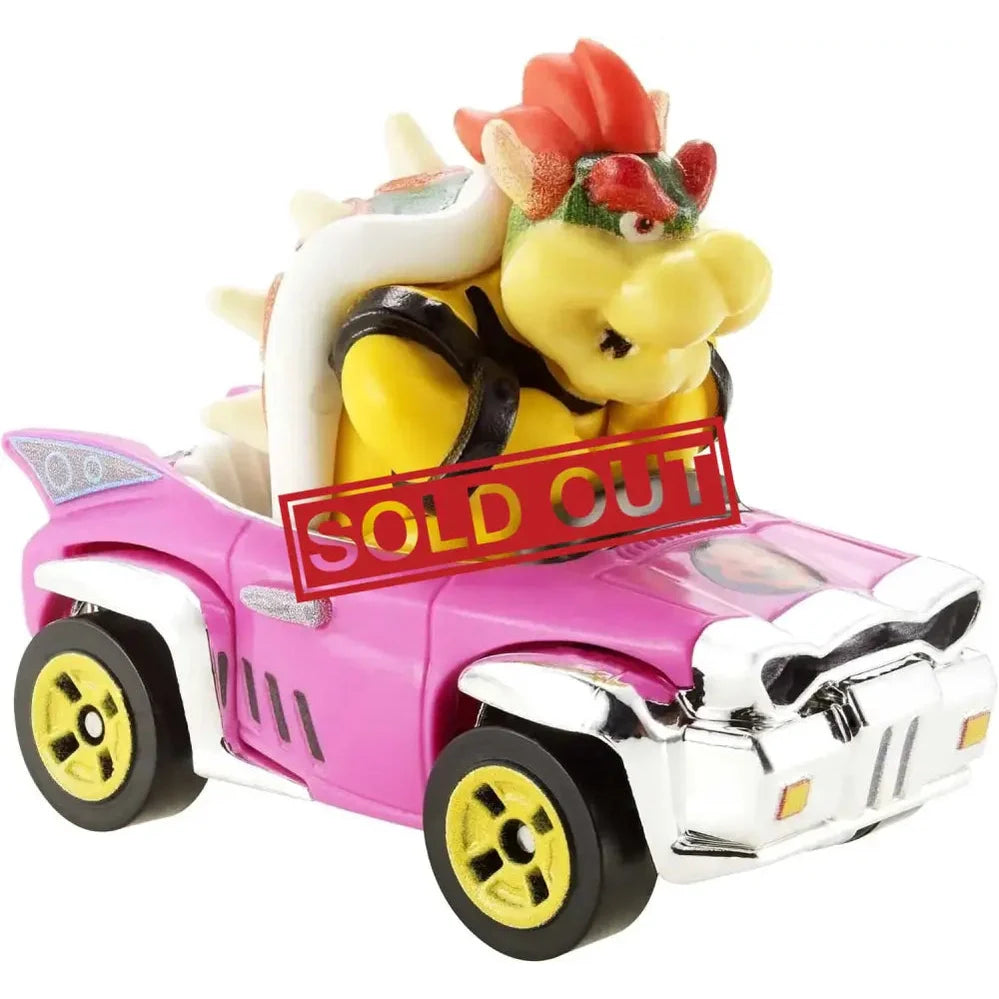 A Hot Wheels Mario Kart Bowser die-cast vehicle with a pink car and yellow wheels.