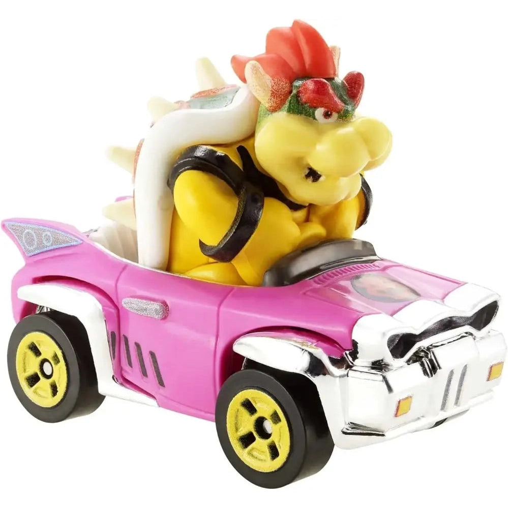 A Hot Wheels Mario Kart Bowser die-cast vehicle with a pink car and yellow wheels.