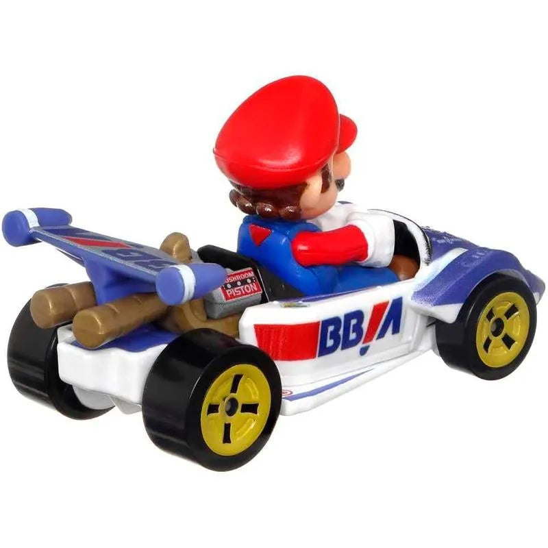 Mario kart toy car with red helmet and blue racing suit, featuring yellow wheels.