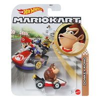 Hot wheels mario kart 1 64 donkey kong standard kart featuring detailed brown fur plastic figure in red black kart