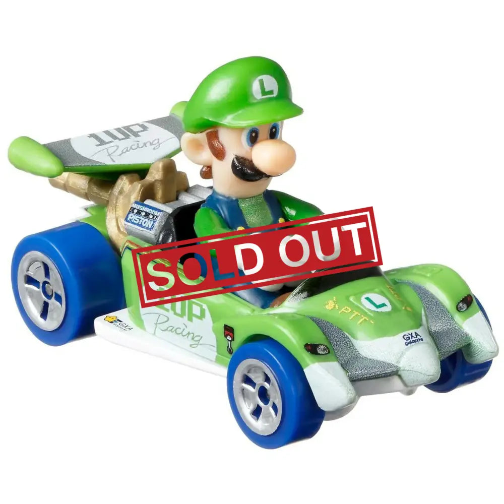 Luigi in a green and blue racing kart.