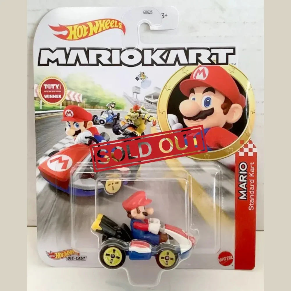 A Hot Wheels Mario Kart toy, specifically a Mario character in his Standard Kart, packaged and marked as ’SOLD OUT’.