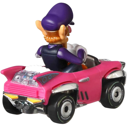 1950s-style pink and white convertible toy car with chrome details, resembling a hot wheels model.