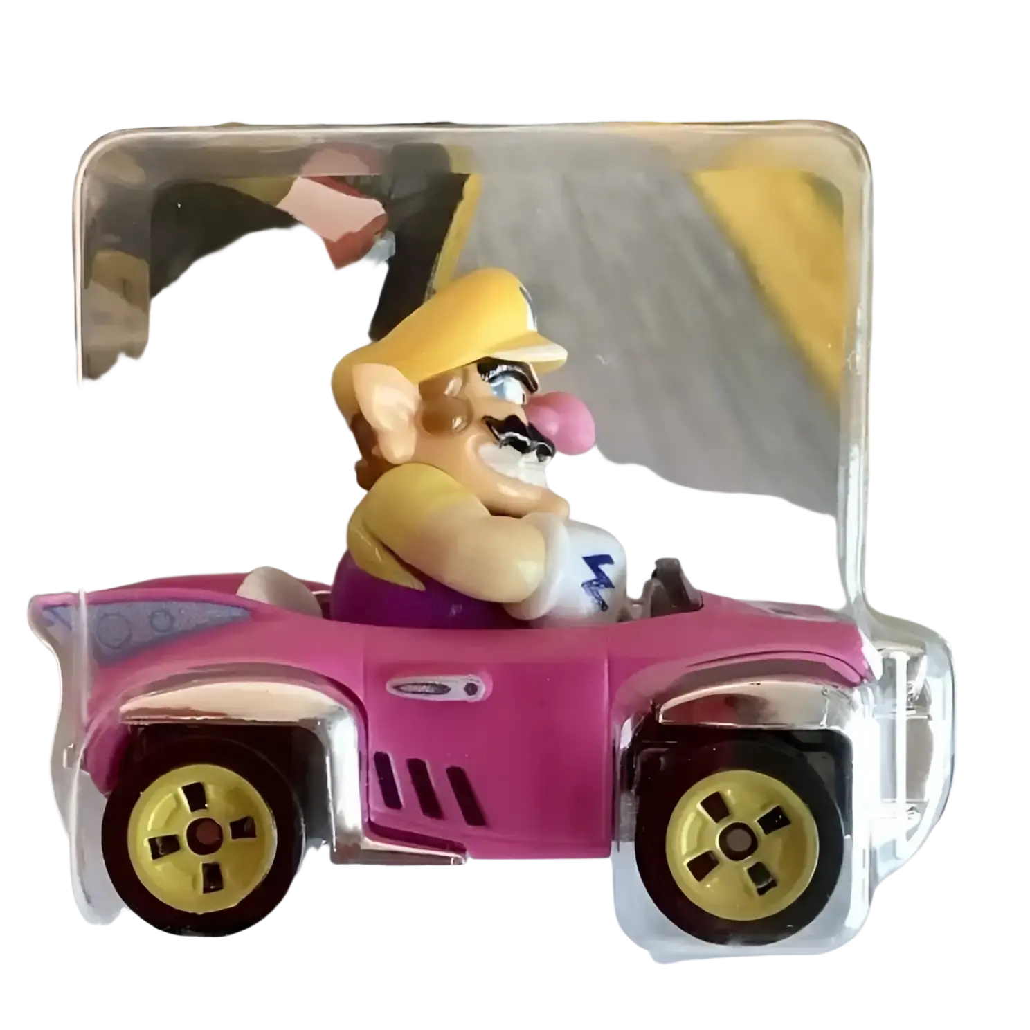 Pink and yellow wario toy car with gold wheels, packaged in clear plastic.
