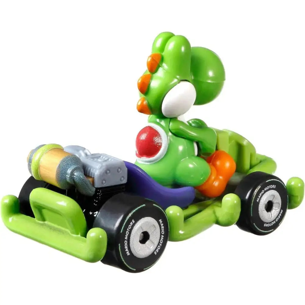 Green dinosaur toy in a racing car, likely plastic with colorful accents and wheels.