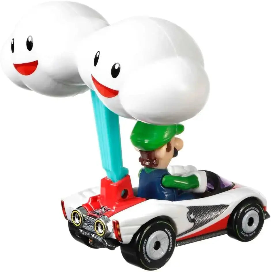 White and red Hot Wheels Mario Kart toy car with Luigi driving and smiling cloud glider on teal pole above vehicle