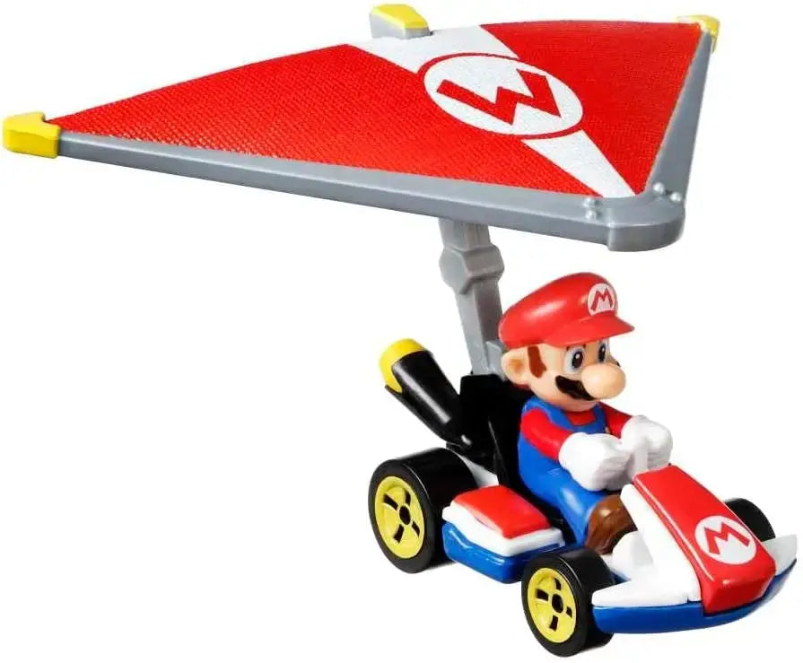 Hot wheels mario kart mario standard kart super glider toy in red white and blue plastic with yellow wheels and red parachute m logo