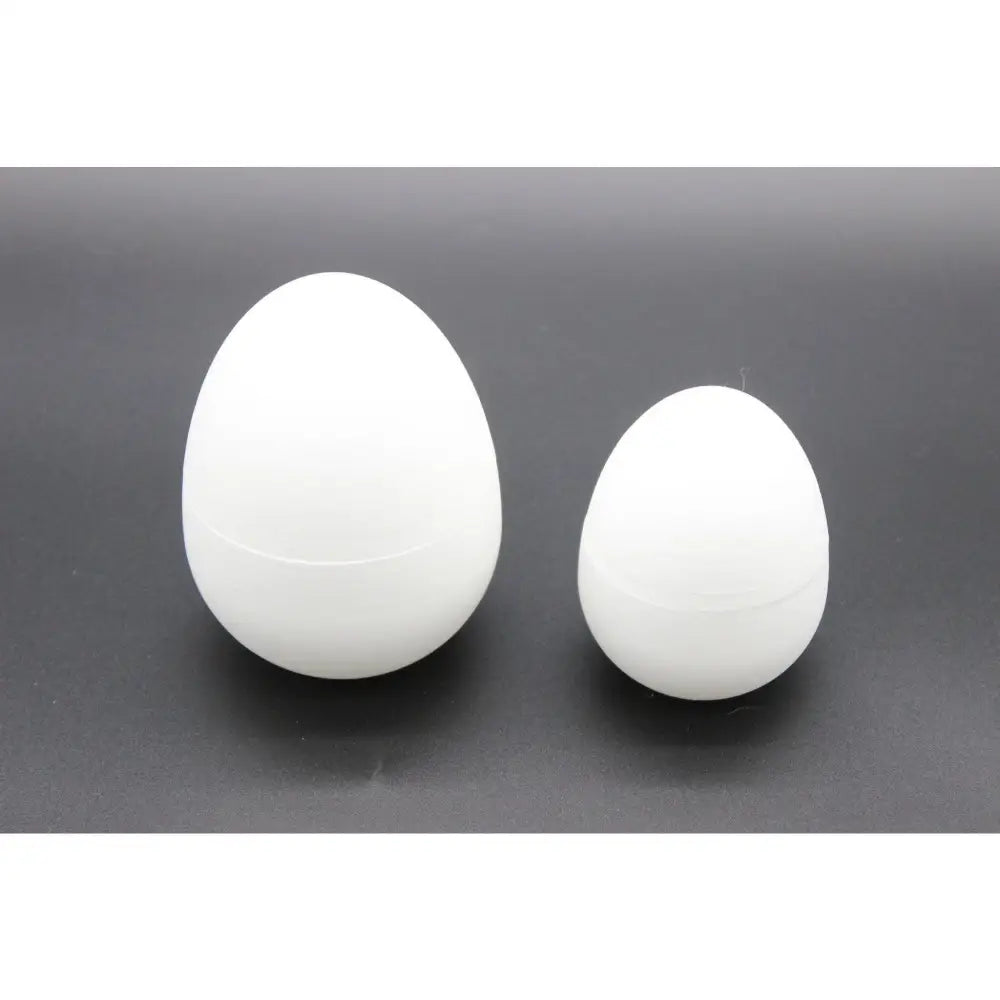 Two white, egg-shaped objects.