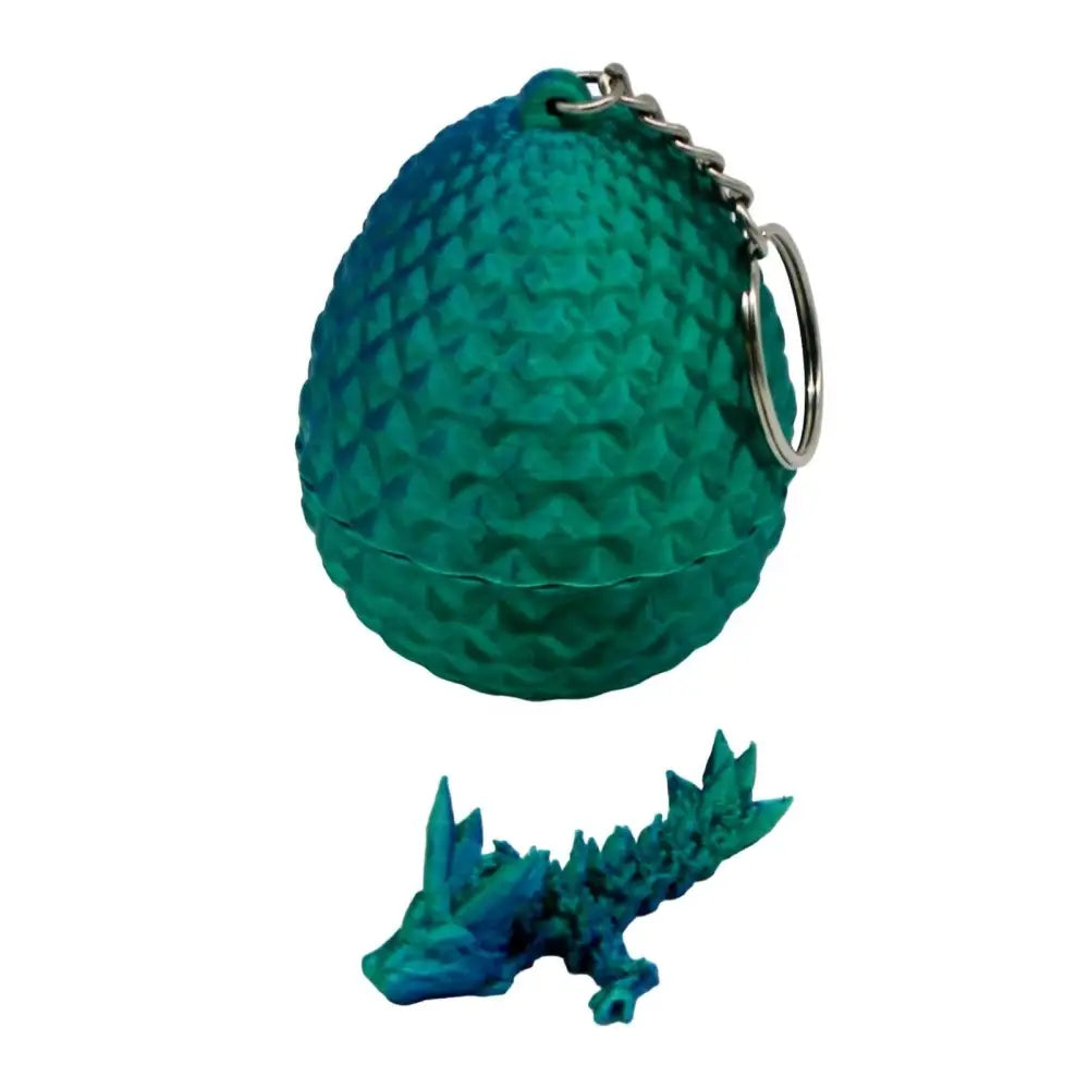 Teal dragon egg keychain with miniature dragon.