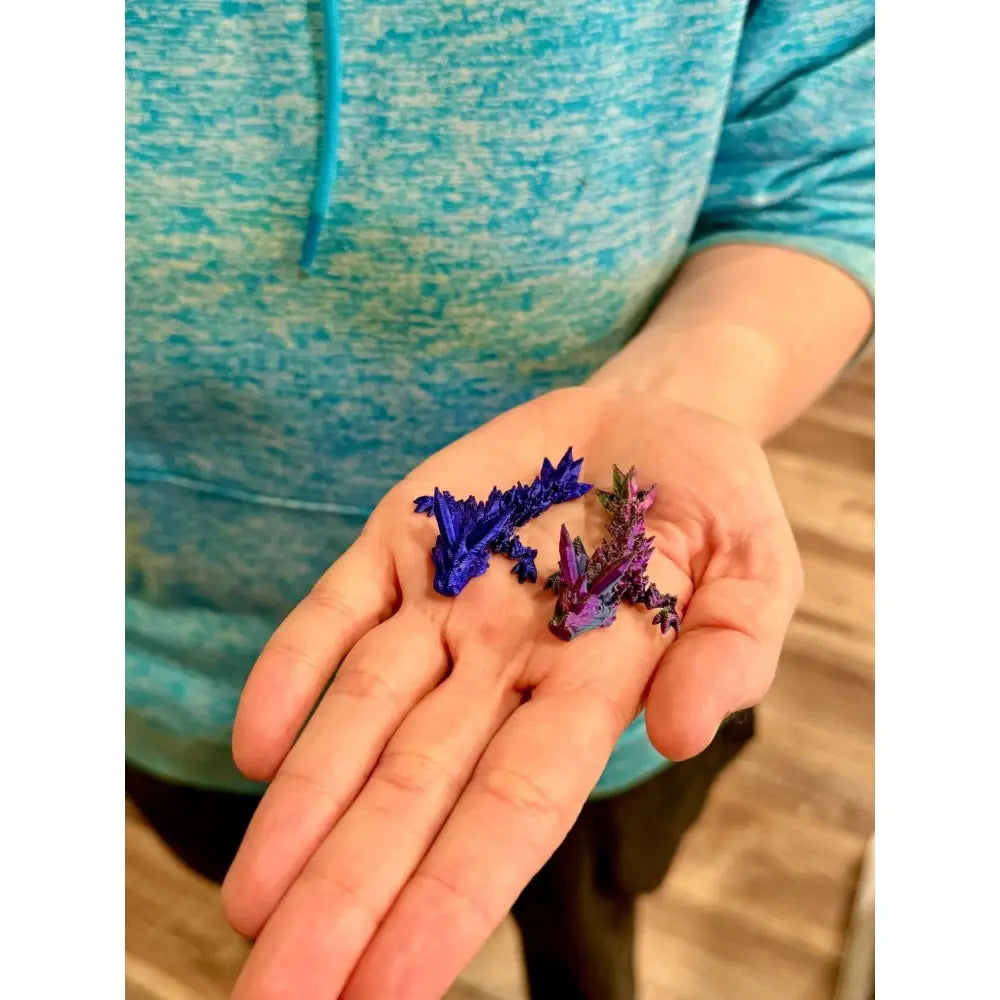 Two miniature crystal dragons.