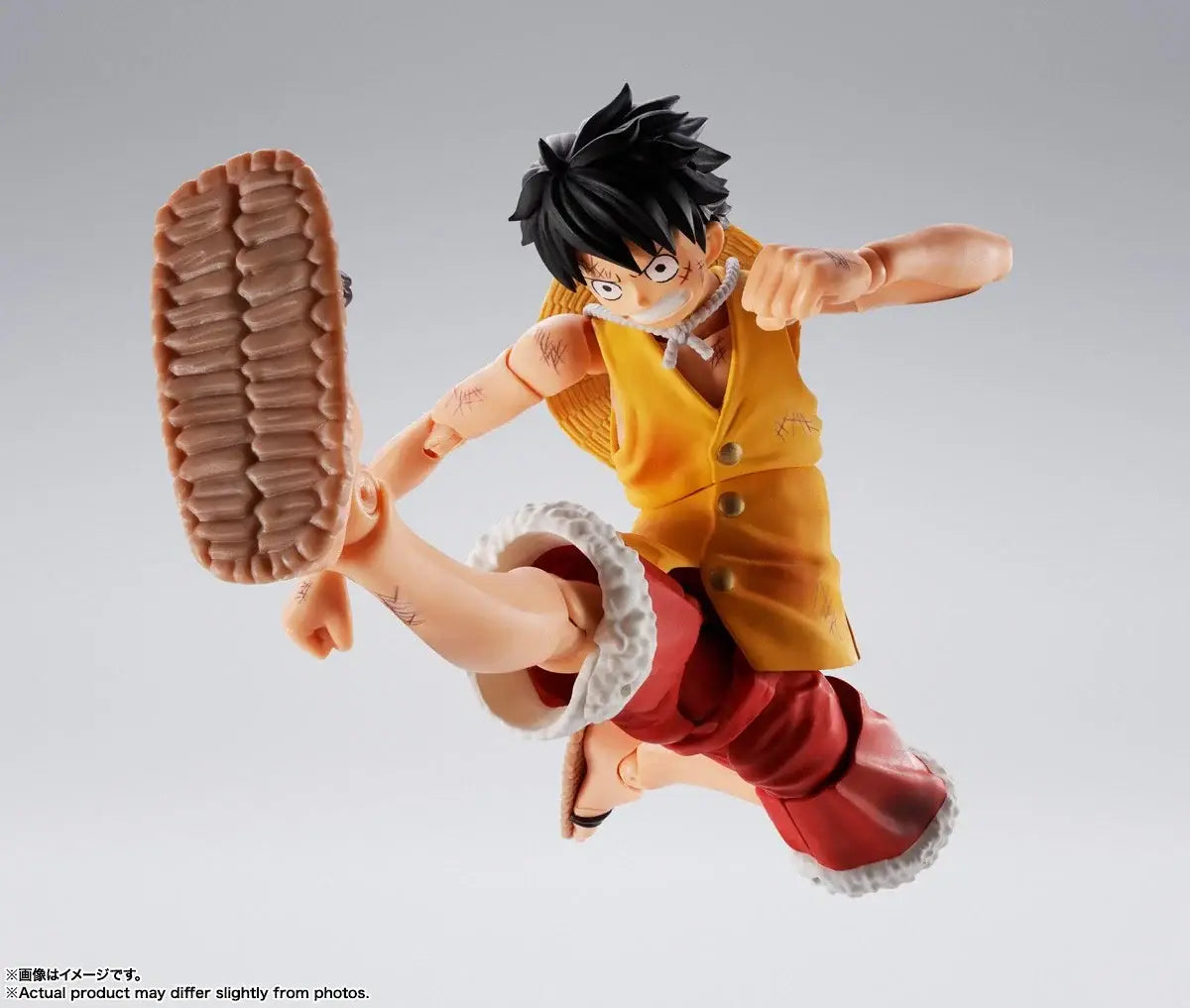 Detailed plastic monkey d luffy marineford figuarts action figure in orange and red outfit with white trim