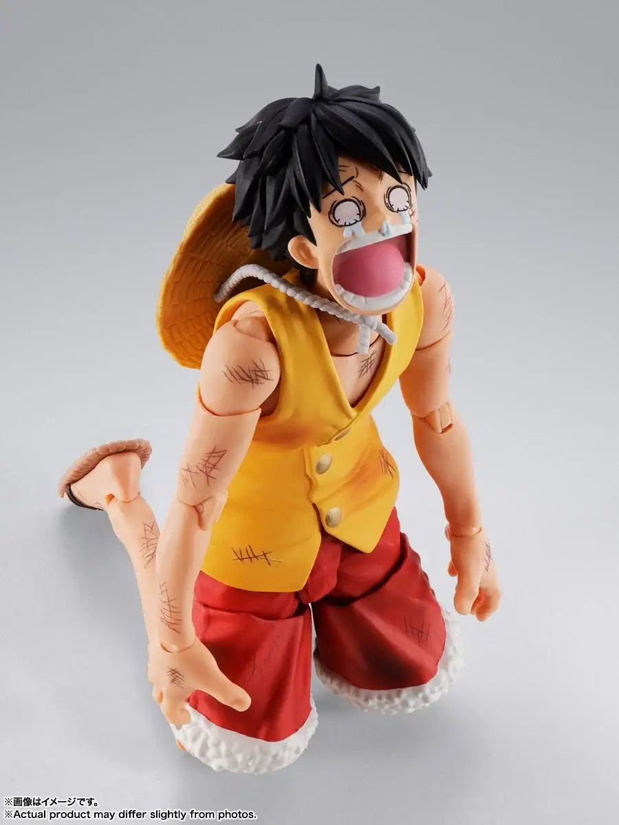 Yellow and red sleeveless vest with white buttons and matching shorts with textured hemline for luffy marineford figuarts action figure