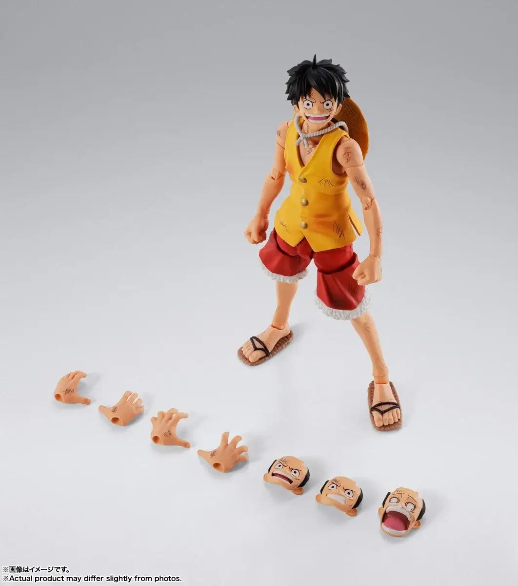 Yellow and red sleeveless vest and matching shorts with white frayed hems worn by luffy marineford figuarts action figure