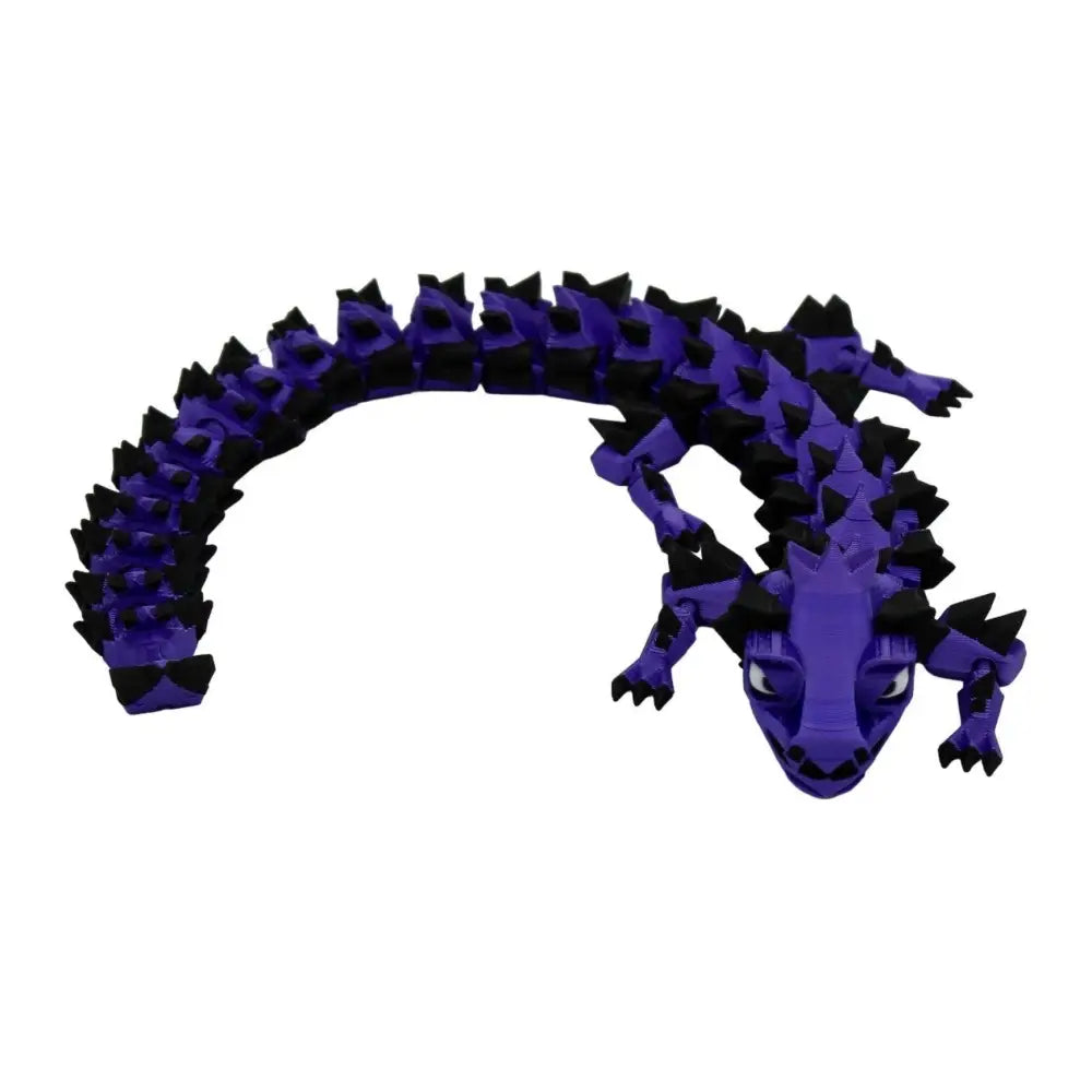 Articulated purple and black dragon toy.
