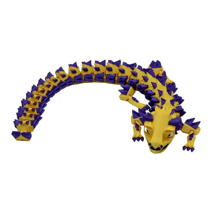 Yellow and purple articulated lizard toy.