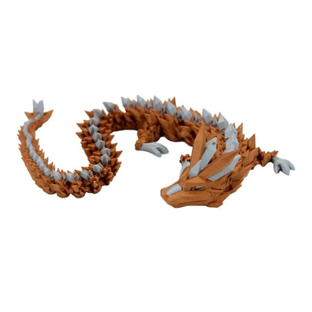 Orange and gray crystal dragon figurine.