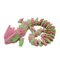 Pink and green articulated dragon.