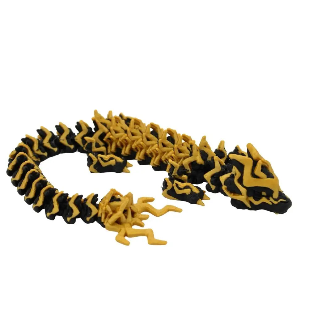 Articulated black and gold dragon.