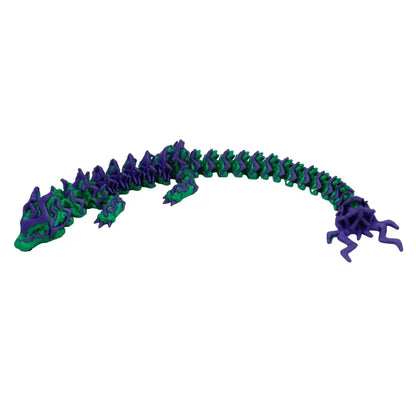 Articulated green and purple dragon toy.