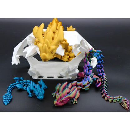 Colorful articulated dragon figurines with a white and gold crystal cave.
