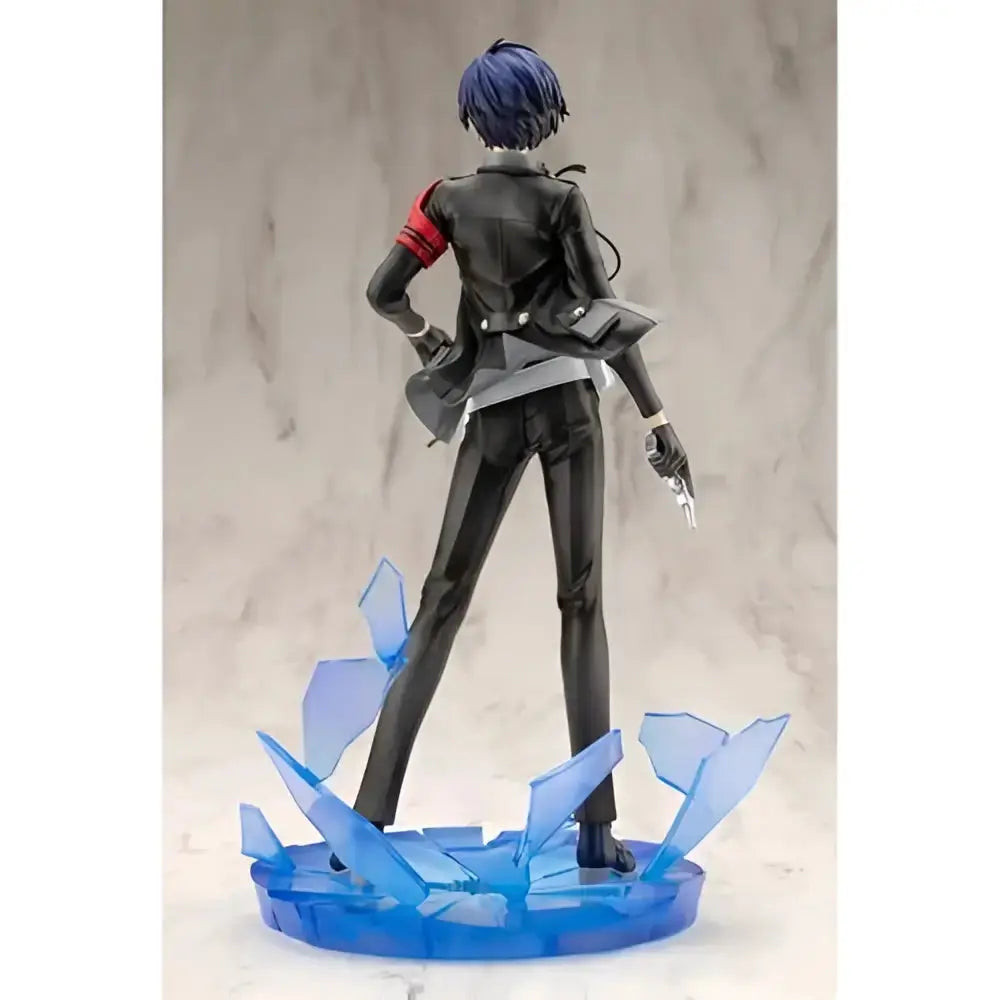 Persona 3 reload the protagonist artfx j 1 8 scale statue features a black and red figure with blue hair on a translucent base