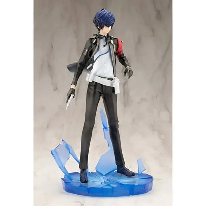 Persona 3 Reload the protagonist artfx j statue features blue-haired male in black leather with red accents on blue base