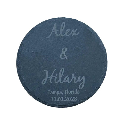 Round slate coaster with engraved names and date.
