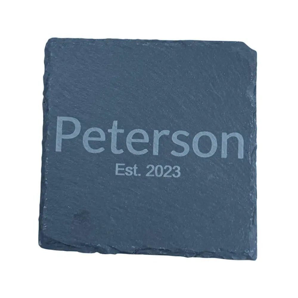 Square slate coaster with ’Peterson Est. 2023’’ engraving