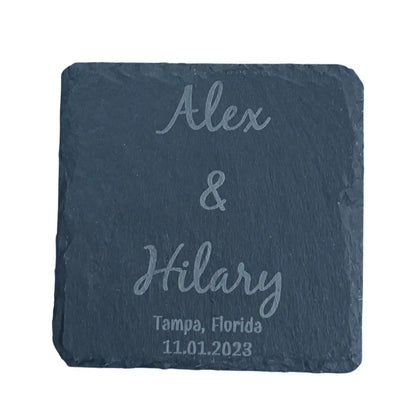 Engraved slate coaster with rounded corners.