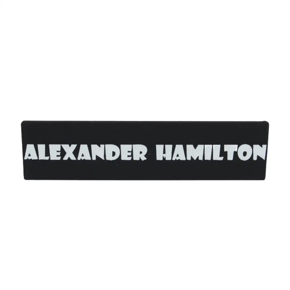 Black nameplate with white text.